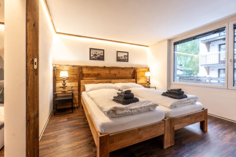 inspringplaceszermatt_apartment_Zermatt_Walliserkanne_Matterhorn_citycenter_apartment_modern_bedroom