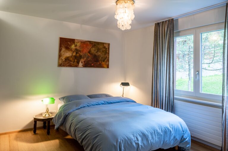 inspringplaceszermatt_family_apartment_Zermatt_Matterhorn_balcony_Chez_Domi&Michou_bedroom4